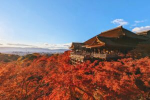 Kiyomizu-dera Temple in Kyoto surrounded by autumn foliage