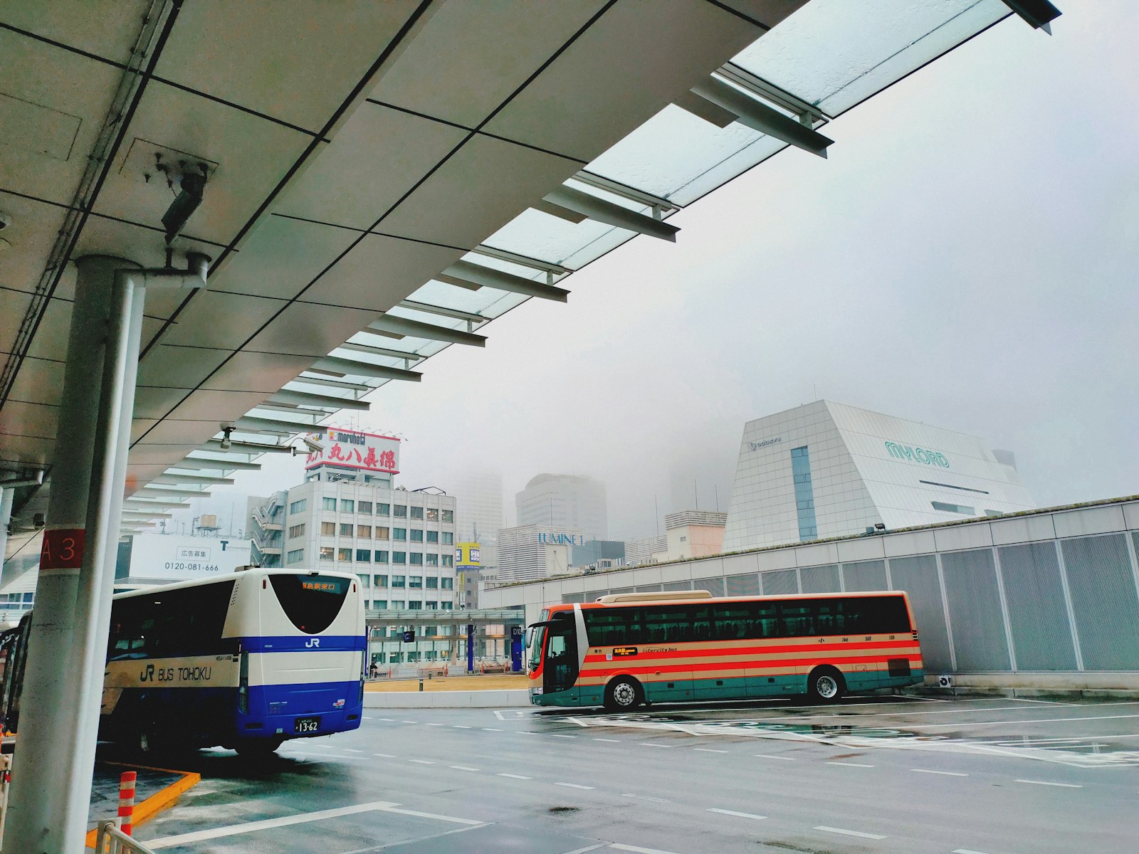 Bus at a Tokyo terminal for a Narita airport transfer guide