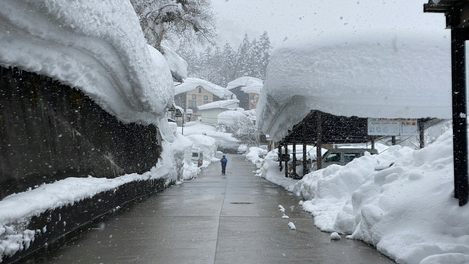 Snowy village street in Nozawa Onsen, Japan
