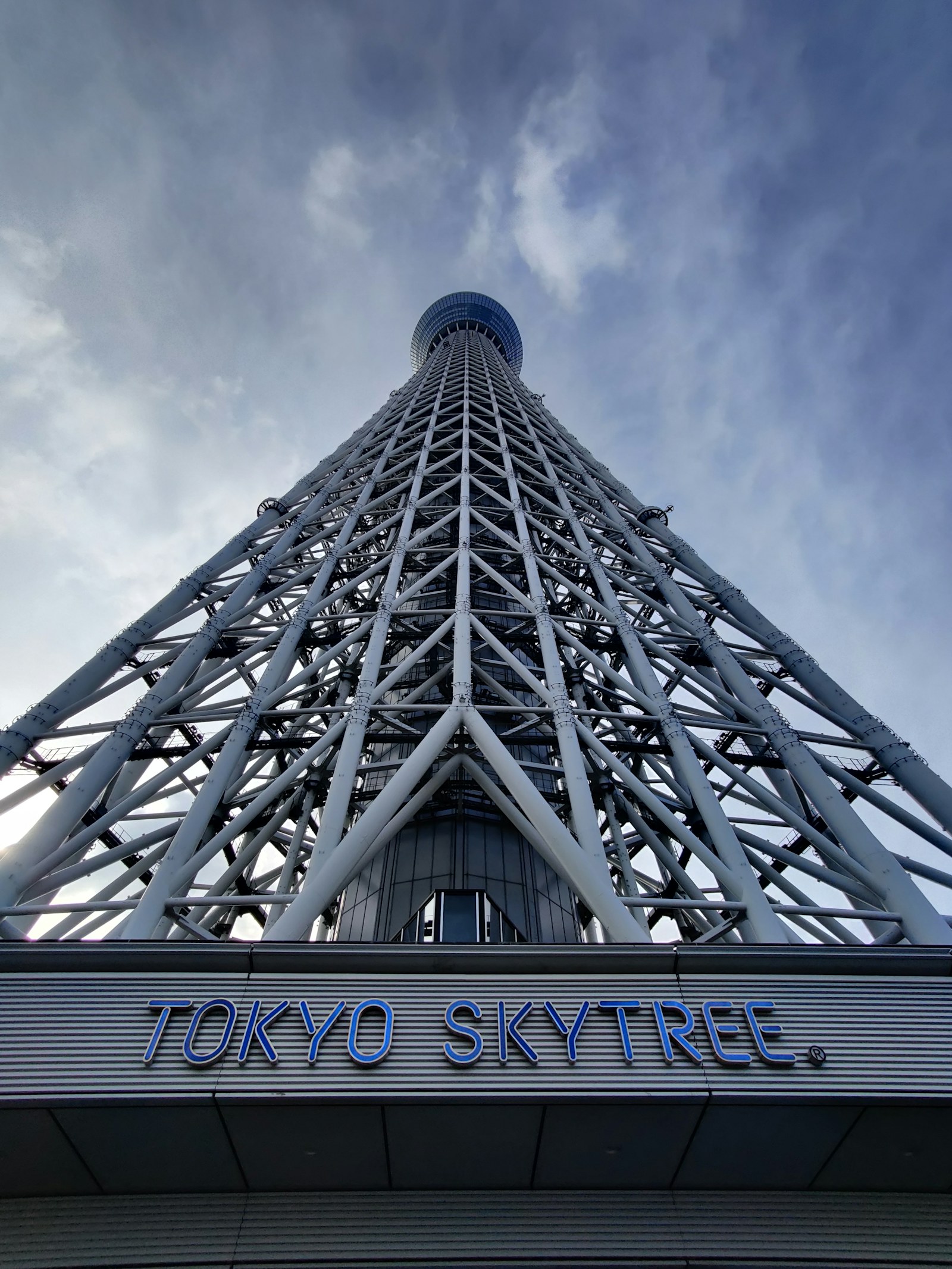 Looking up at TOKYO SKYTREE from the base