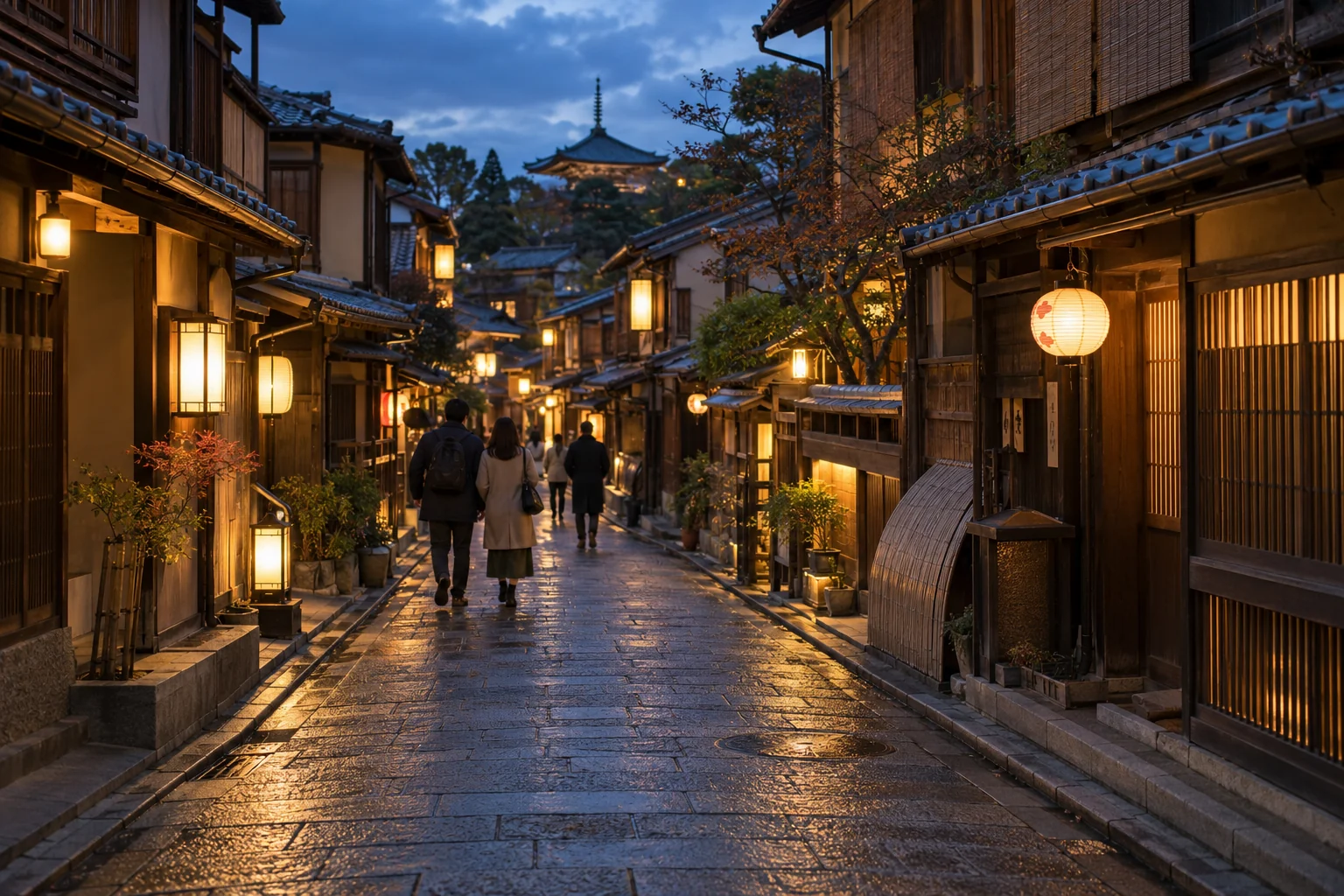 Warmly lit traditional street in Kyoto at dusk